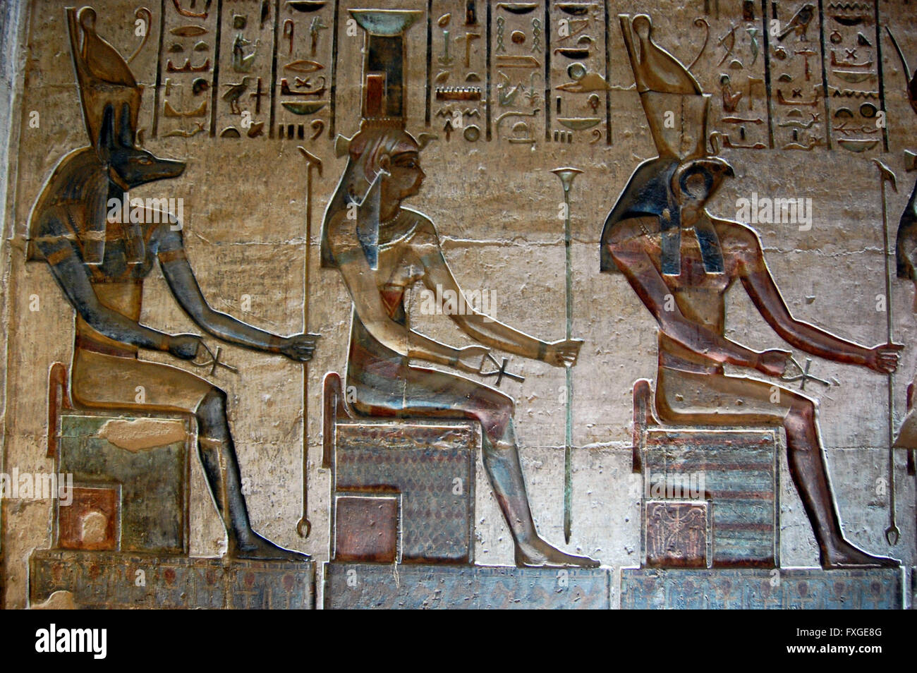 A wall carving hieroglyphic with coloured paint, in Valley of the Kings, Luxor, Egypt Stock Photo