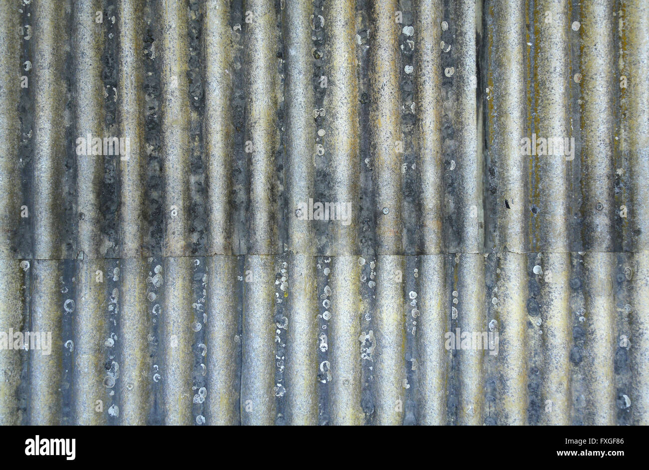 Rusty corrugated metal sheets with rivets Stock Photo Alamy