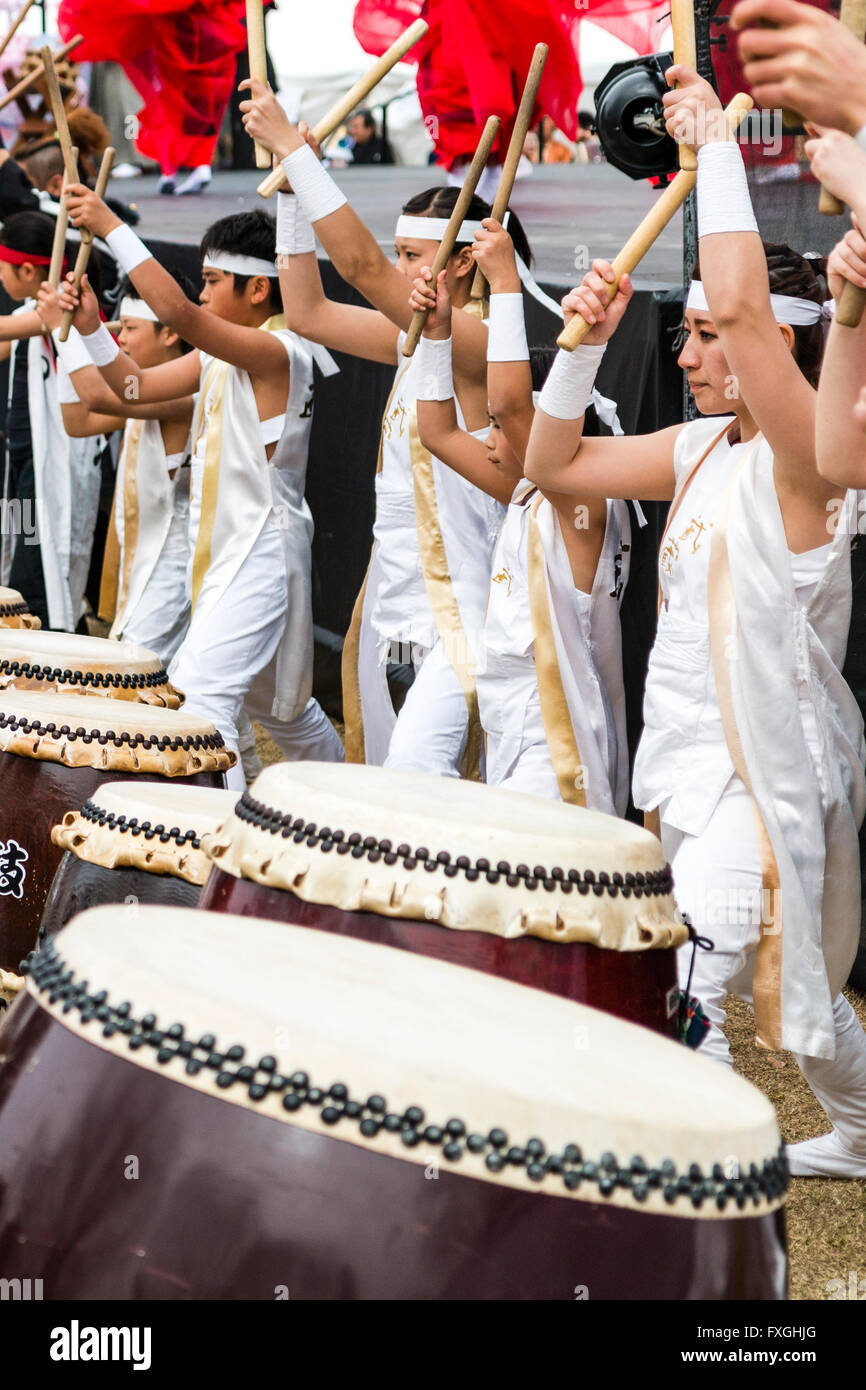 Taiko Drummers, kumidaiko concert. Side view of row of children and