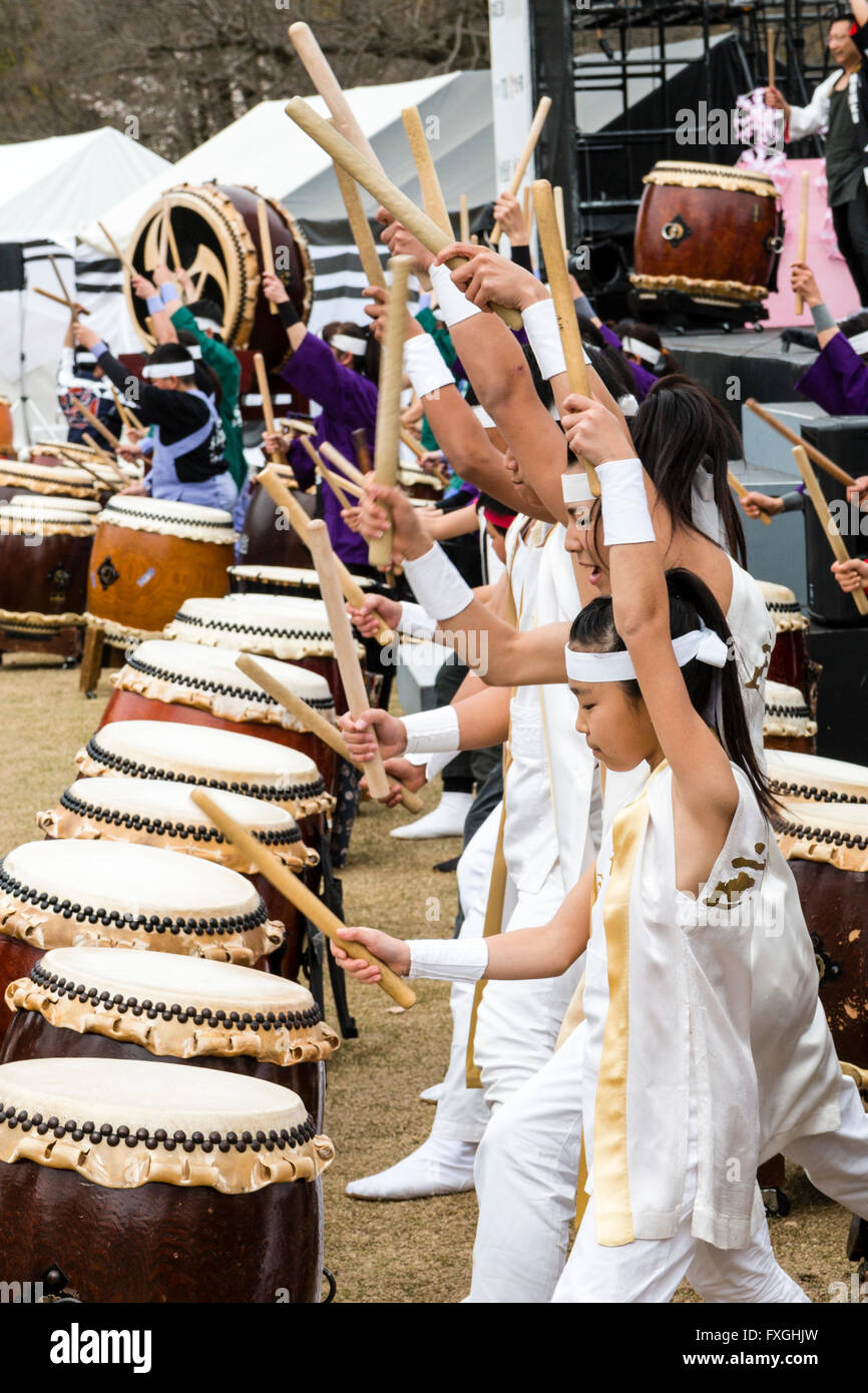 Taiko Drummers, kumidaiko concert. Side view of row of children and