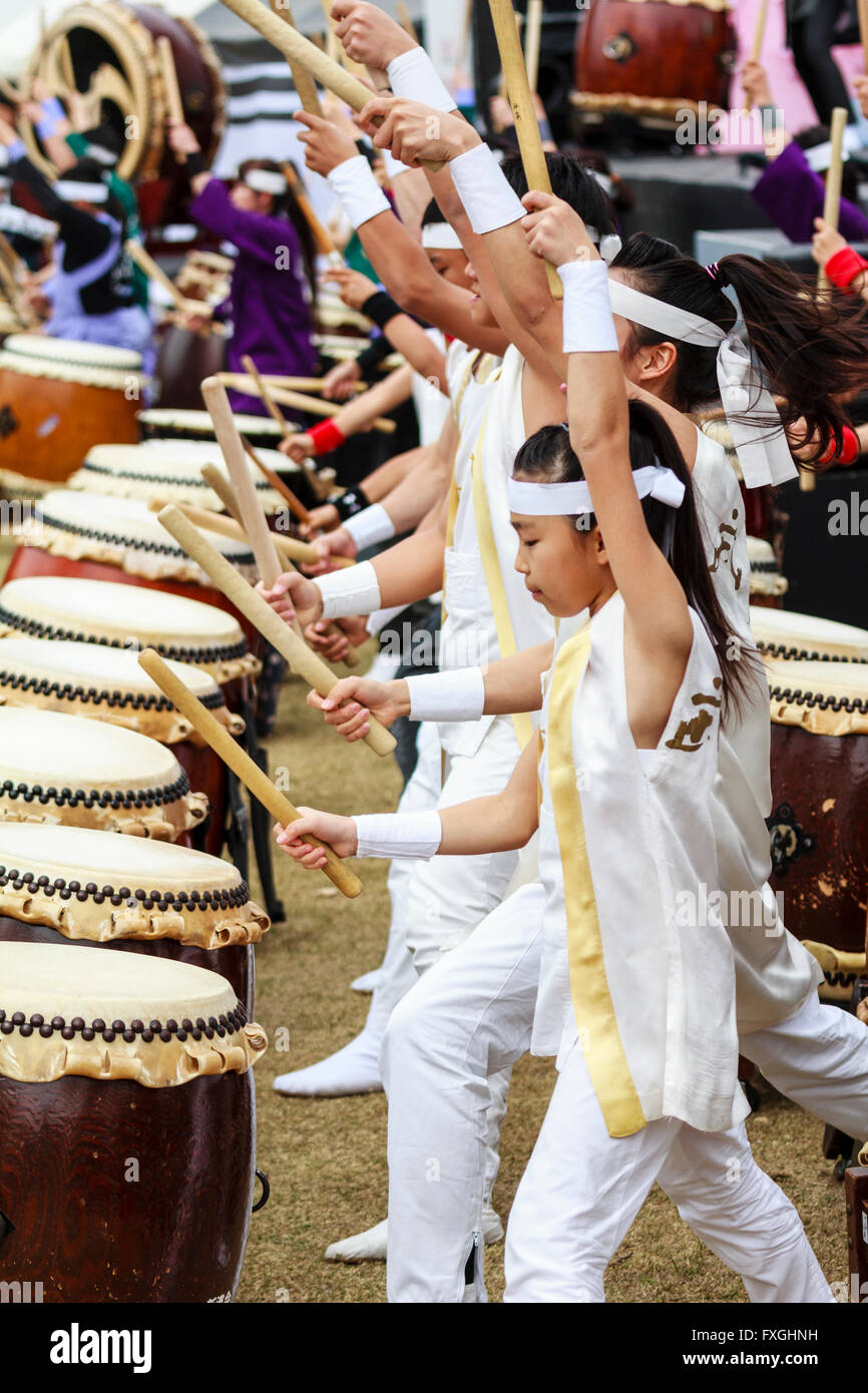 Taiko Drummers, kumidaiko concert. Side view of row of children and