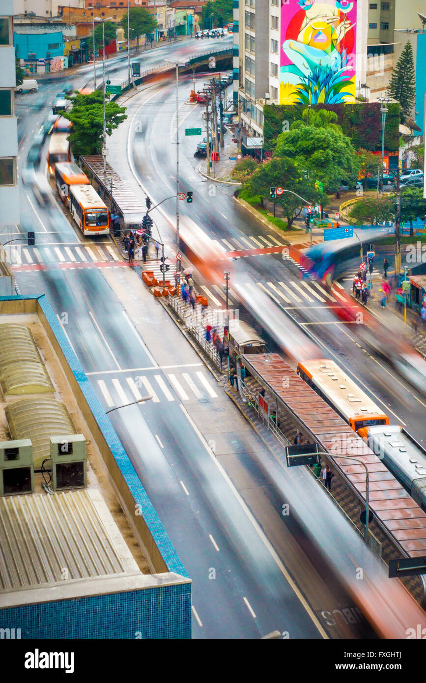Intense traffic in the Consolacao avenue, Sao Paulo, Brazil, where buses, cars, and people share the same spot. Stock Photo