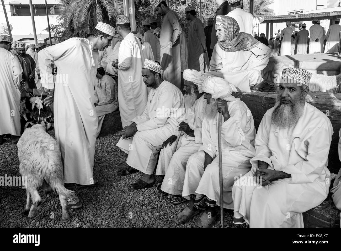 Omani Men At The Friday Livestock Market, Nizwa, Ad Dakhiliyah Region, Oman Stock Photo