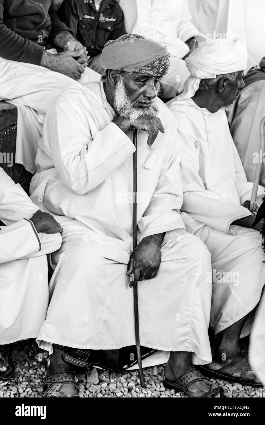 An Elderly Omani Man In Traditional Dress At The Friday Livestock Market, Nizwa, Ad Dakhiliyah Region, Oman Stock Photo