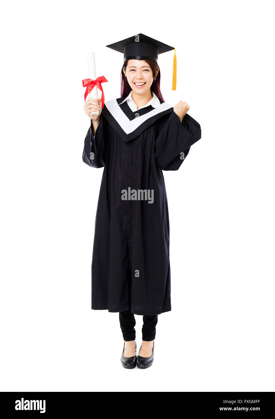 full length of  young female college graduation Stock Photo