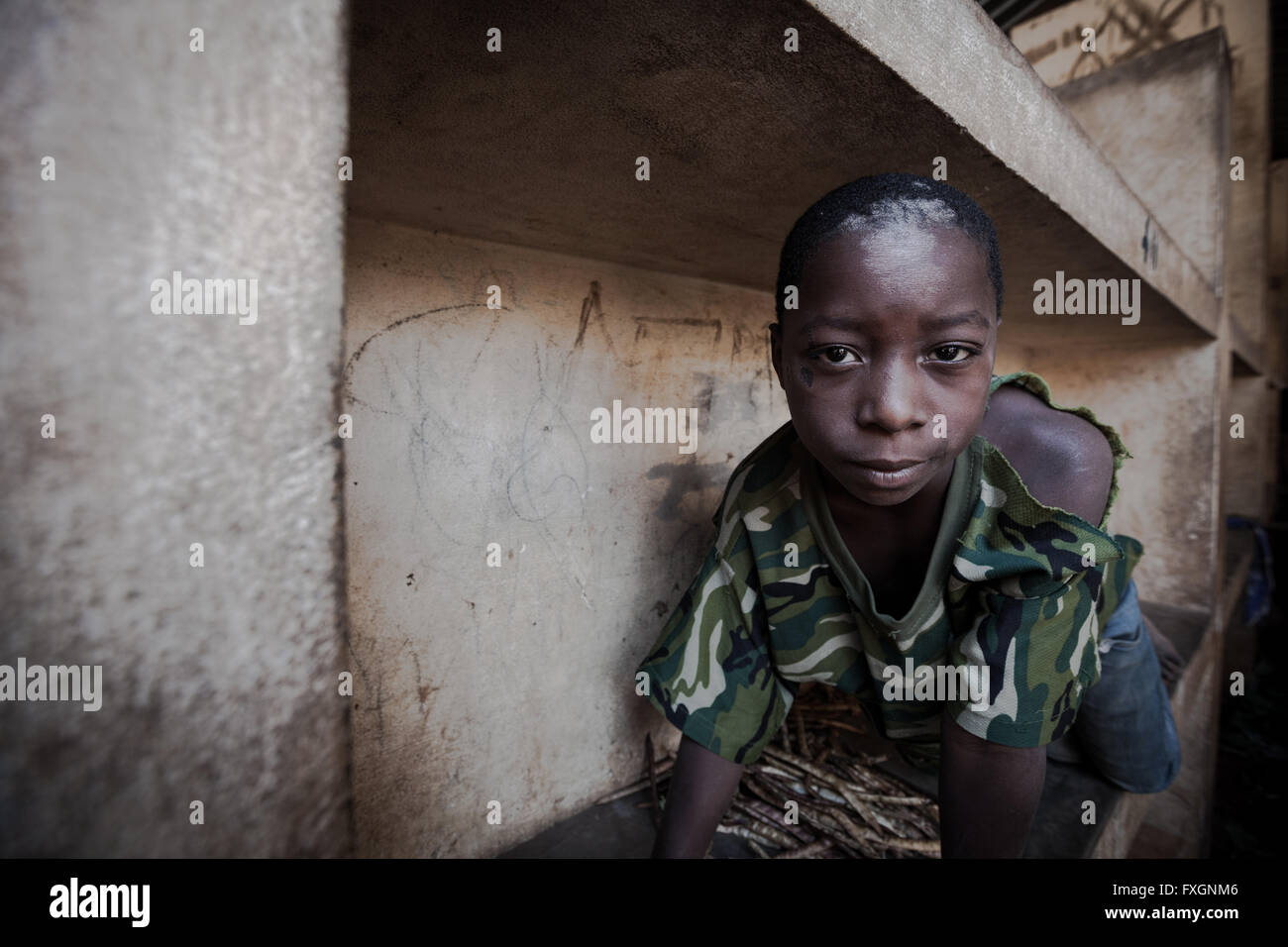 Here poor boy hi-res stock photography and images - Alamy