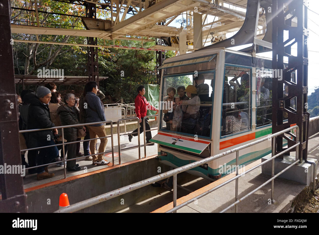 People at the ropeway station to go up Misen Mountain, Miyajima Island, Hiroshima Prefecture, Japan Stock Photo