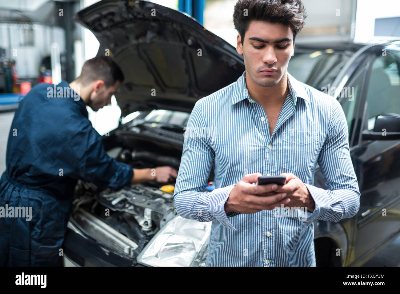 Customer text messaging on the mobile Stock Photo