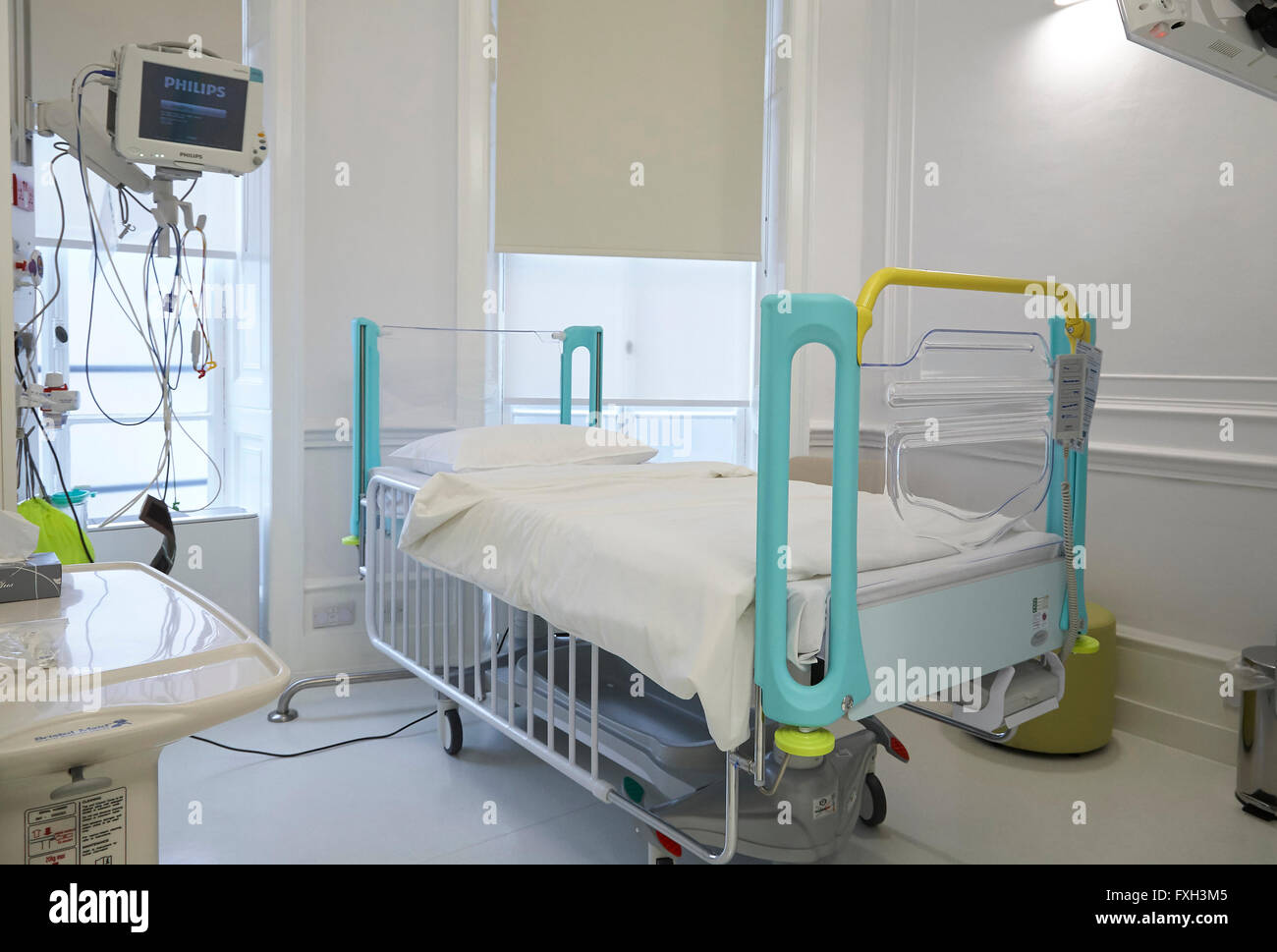 An Empty bed in a hospital ward in the UK. Stock Photo