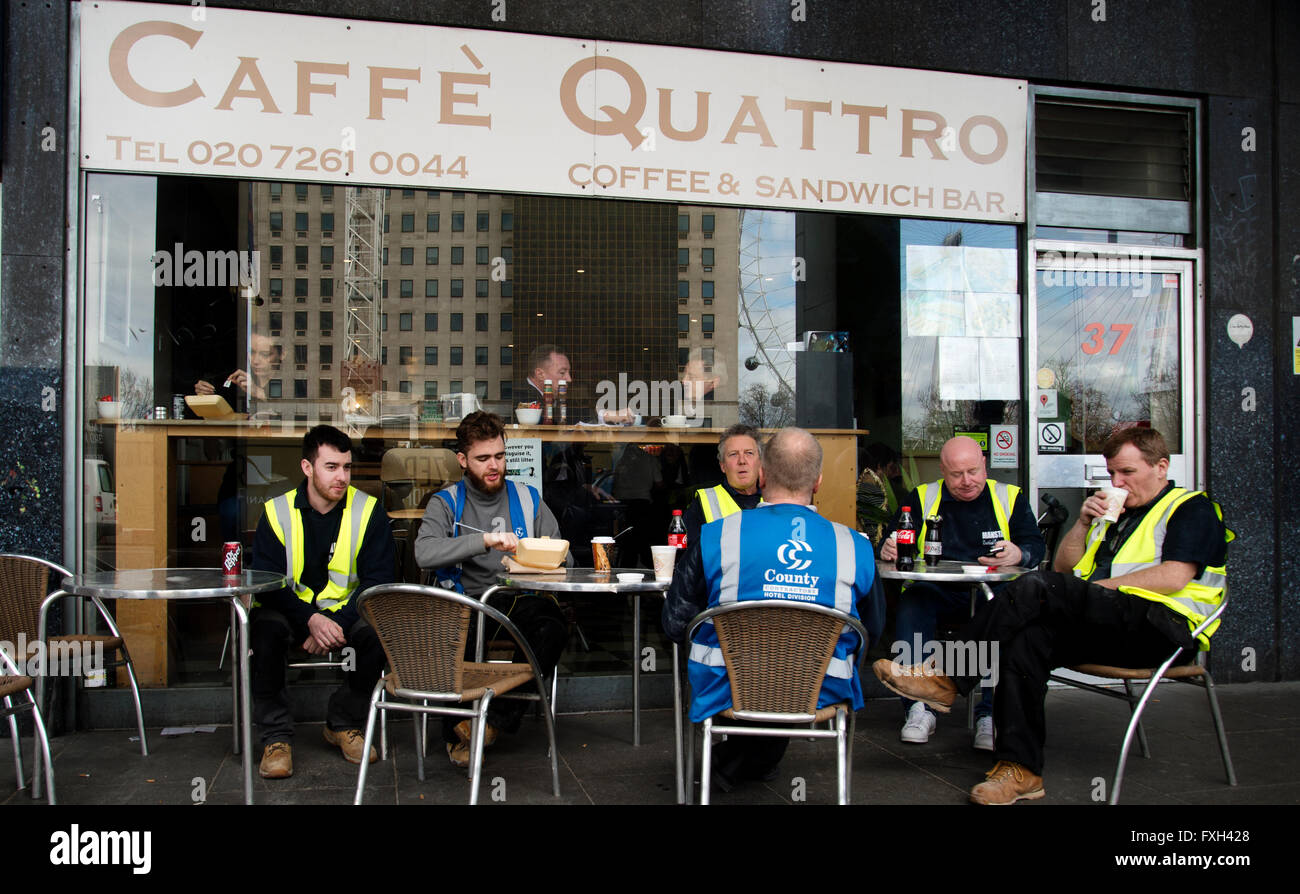 London. Waterloo. Workman have lunch at a cafe, sitting outside Stock