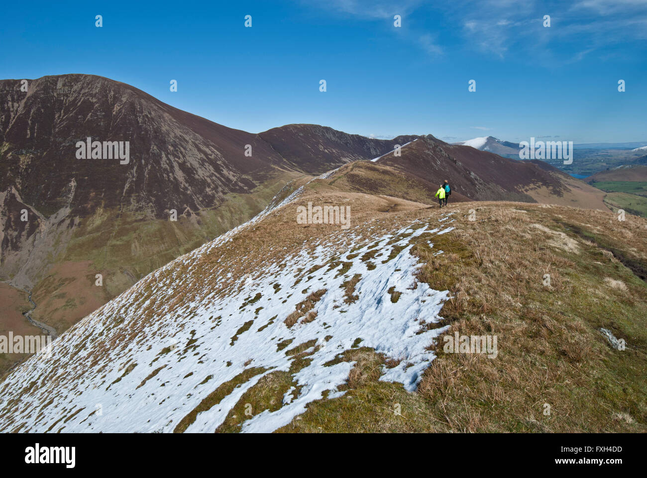 Family walk on Lake District fell Ard Crags in the Newlands Valley in early Spring. Stock Photo