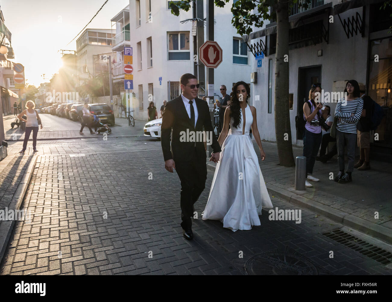 Wedding couple during their photo session at Shalom Shabazi street in