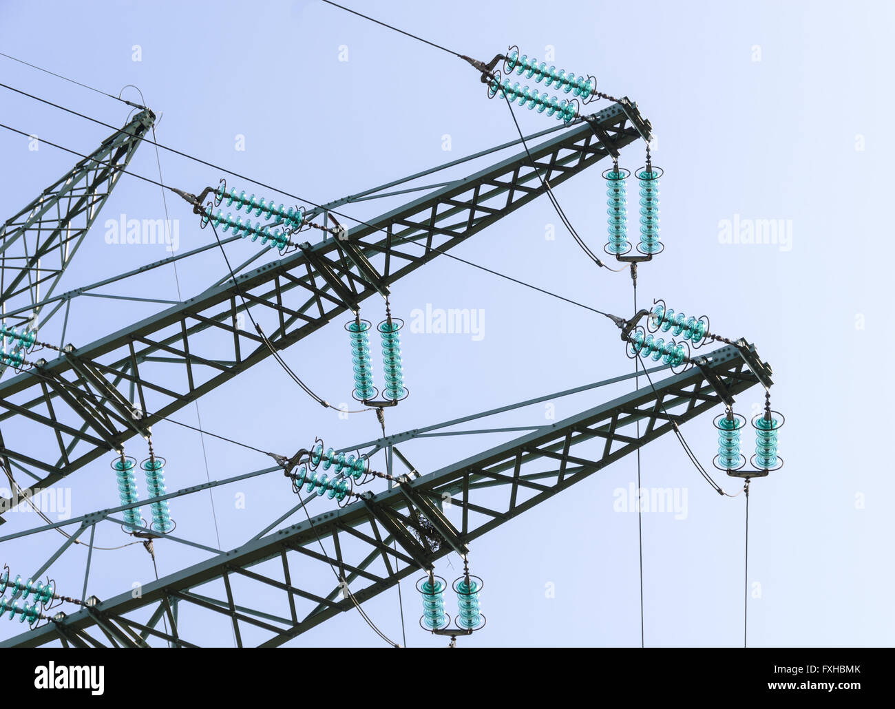 Traverses at a tension tower of a high-voltage line Stock Photo
