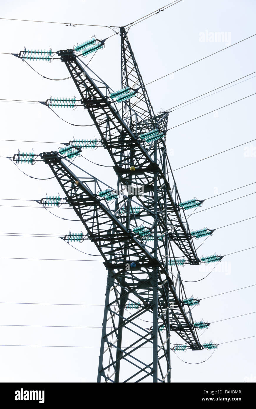Tension tower with traverses of a high-voltage line Stock Photo