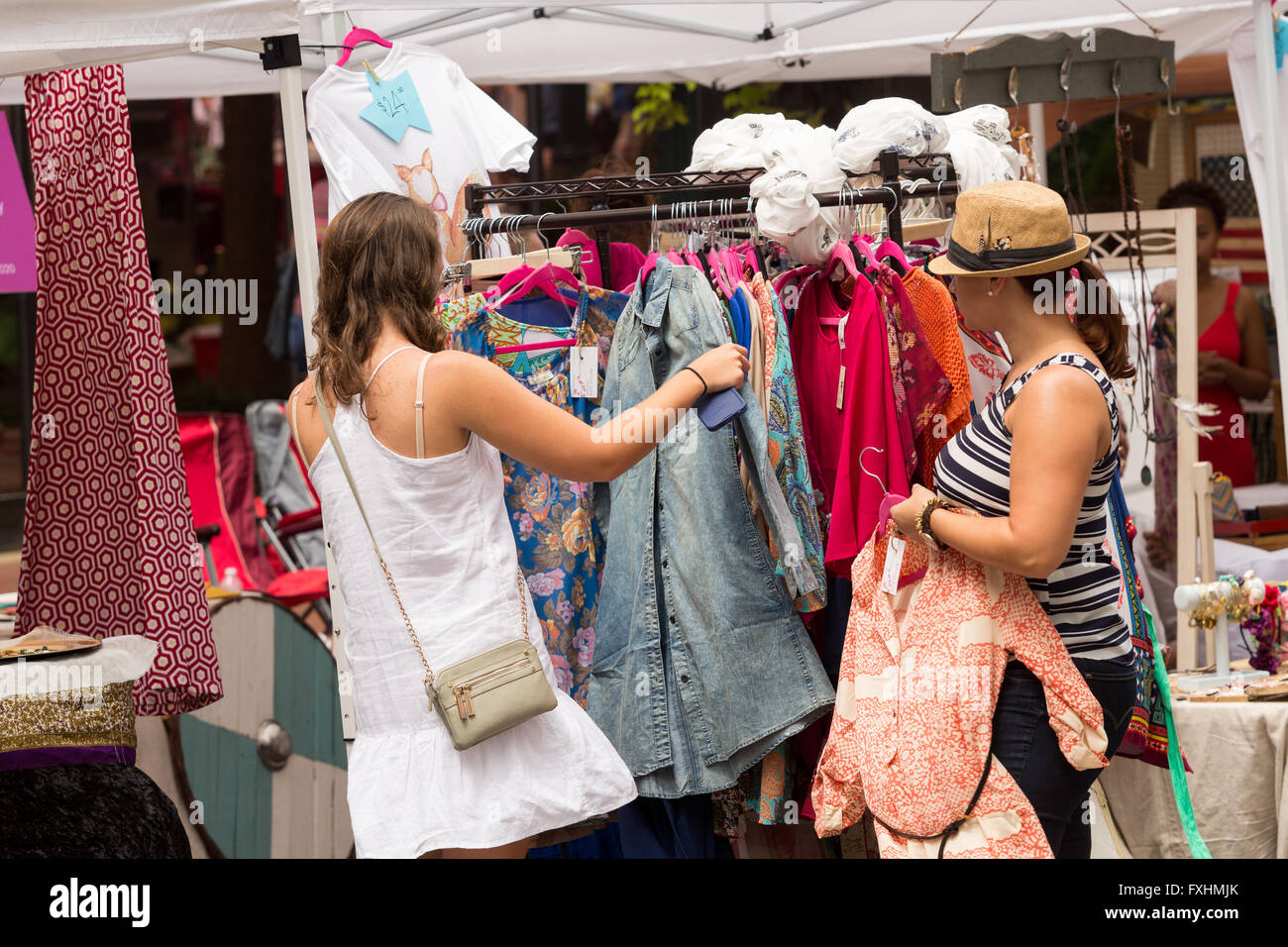 Women shop at the weekly Farmers Market on Assembly Street in Columbia, SC. Stock Photo