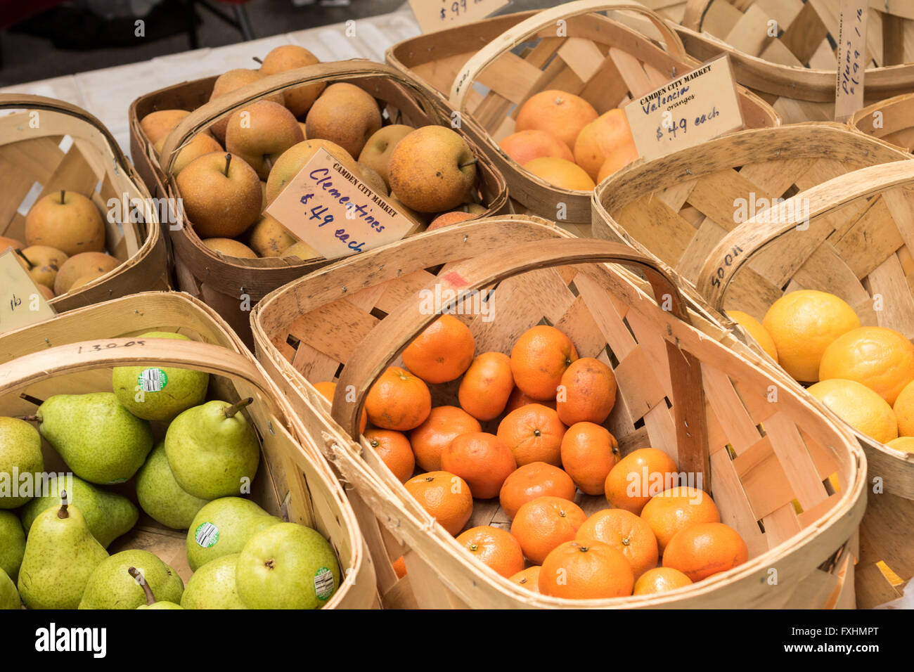 Locally grown apples and fruit at a produce stand at the weekly Farmers Market on Assembly Street in Columbia, SC. Stock Photo