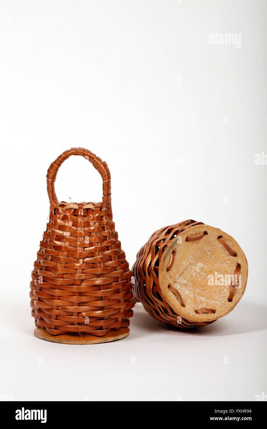 Caxixi. Percussion basket shaker with seeds or beads inside. Stock Photo
