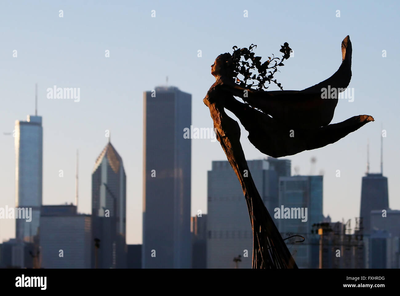Daphne Garden sculpture by Dessa Kirk in Northerly Island Park with the Chicago skyline in the background in Chicago, IL, USA Stock Photo