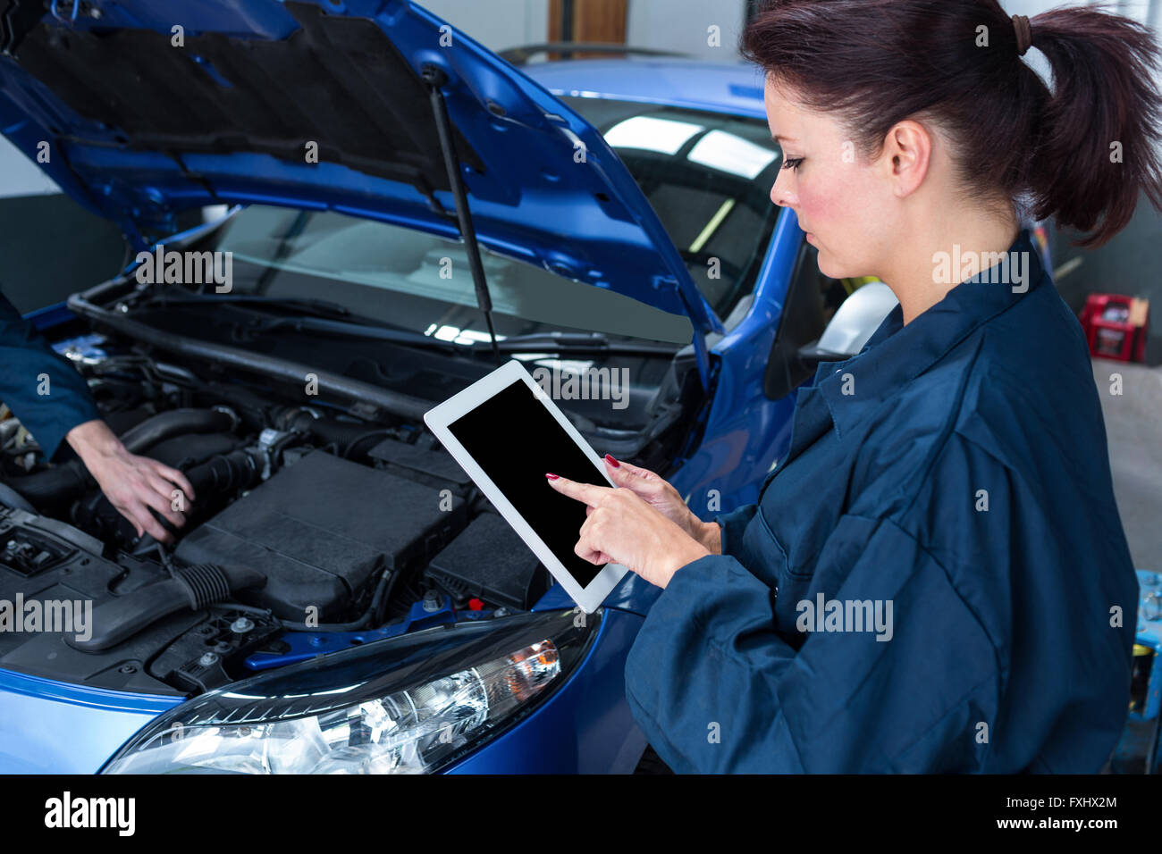 Young female auto mechanic hi-res stock photography and images - Alamy