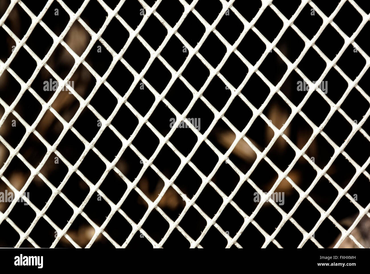 White plastic mesh in diamond grid pattern background Stock Photo - Alamy