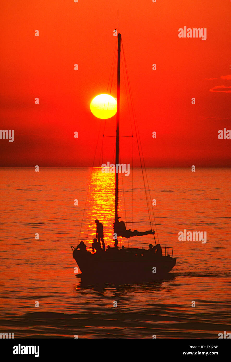 Orange sunset view of sailboat on Lake Michigan; Michigan; USA Stock ...