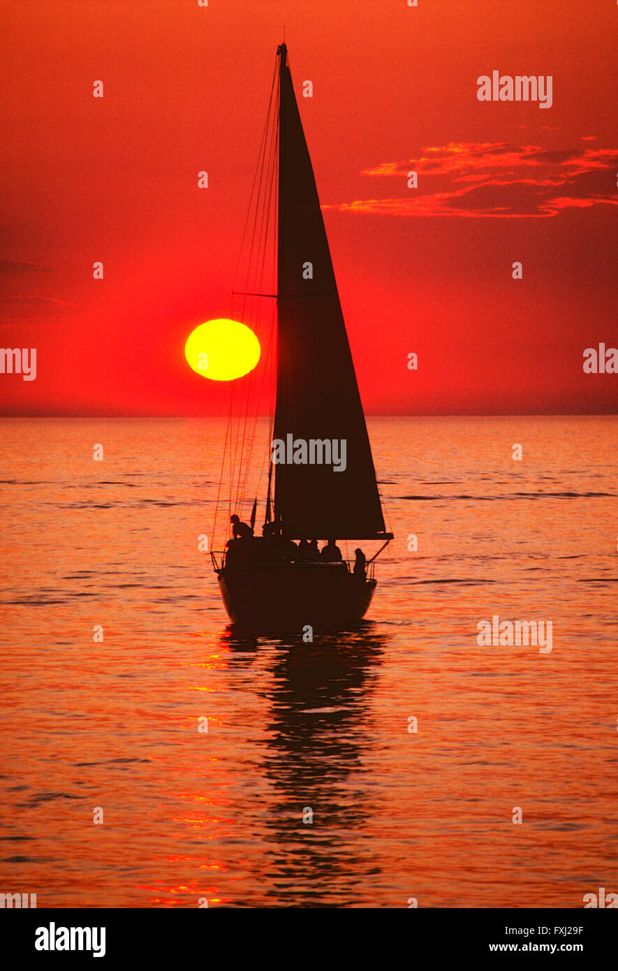 Orange sunset view of sailboat on Lake Michigan; Michigan; USA Stock ...