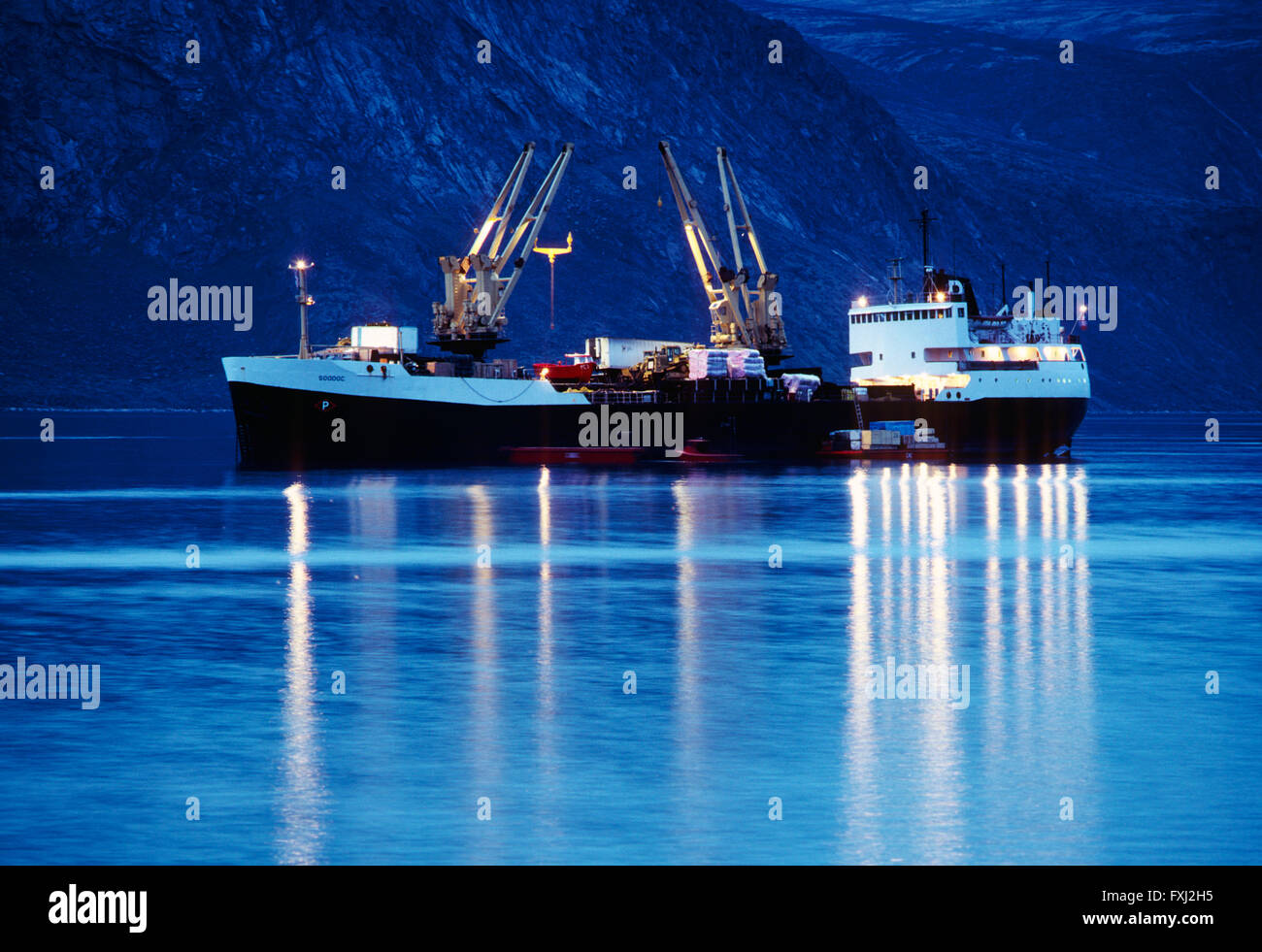 Dusk view; annual supply ship; Pangnirtung; Baffin Island; Nunavut; Canada Stock Photo