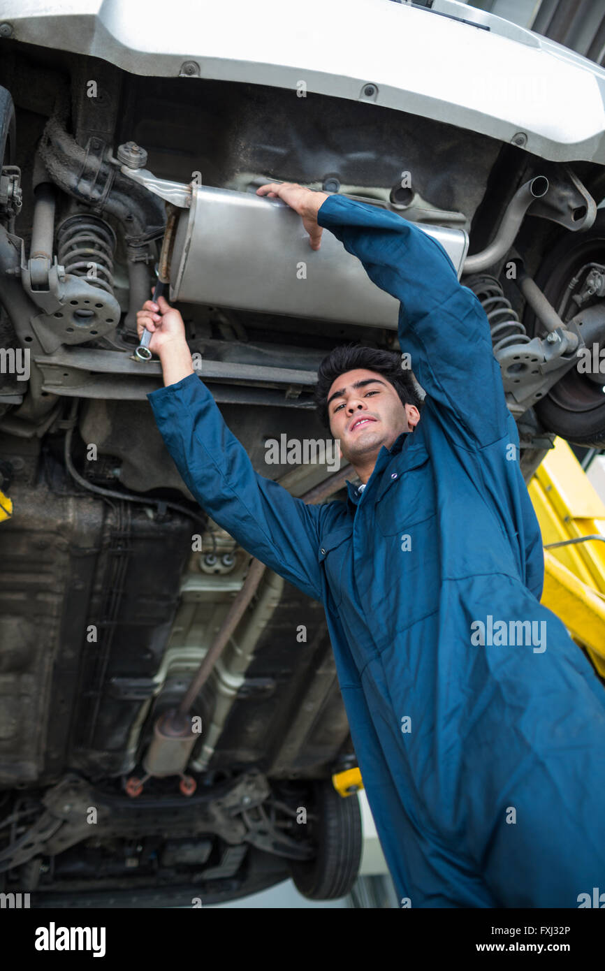 Mechanic repairing a car Stock Photo - Alamy