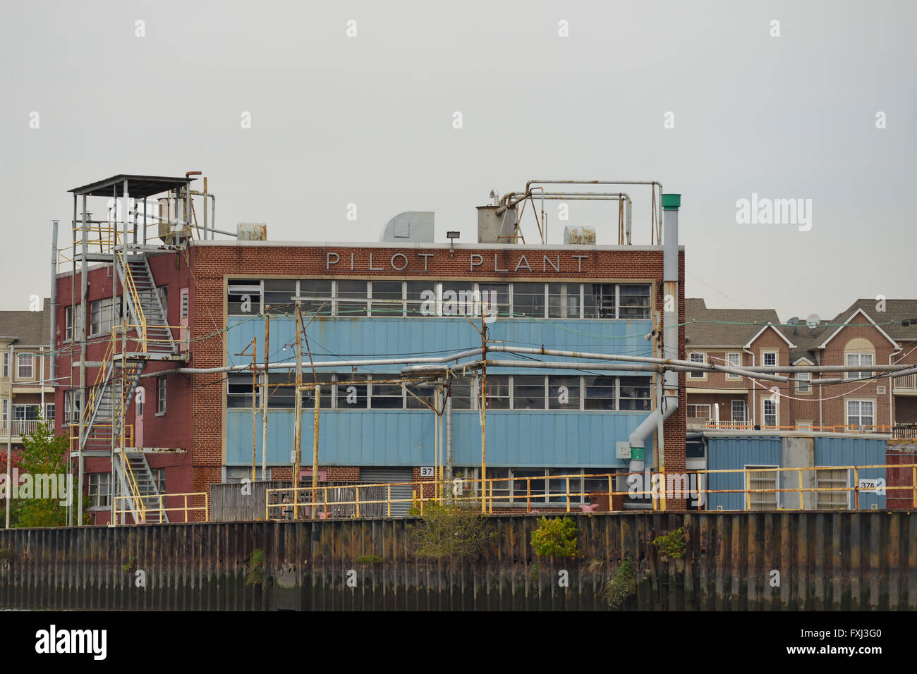 View of a Pilot Plant in Harrison, NJ from the Passaic River. Newark/Harrison, New Jersey, USA Stock Photo