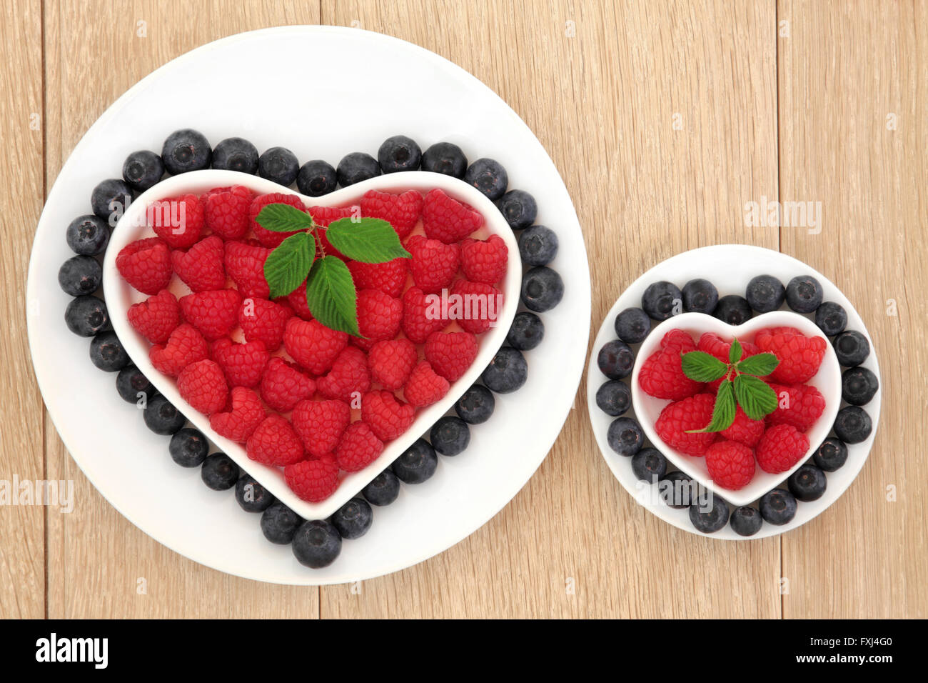 Blueberry and strawberry antioxidant fruit in heart and round shaped