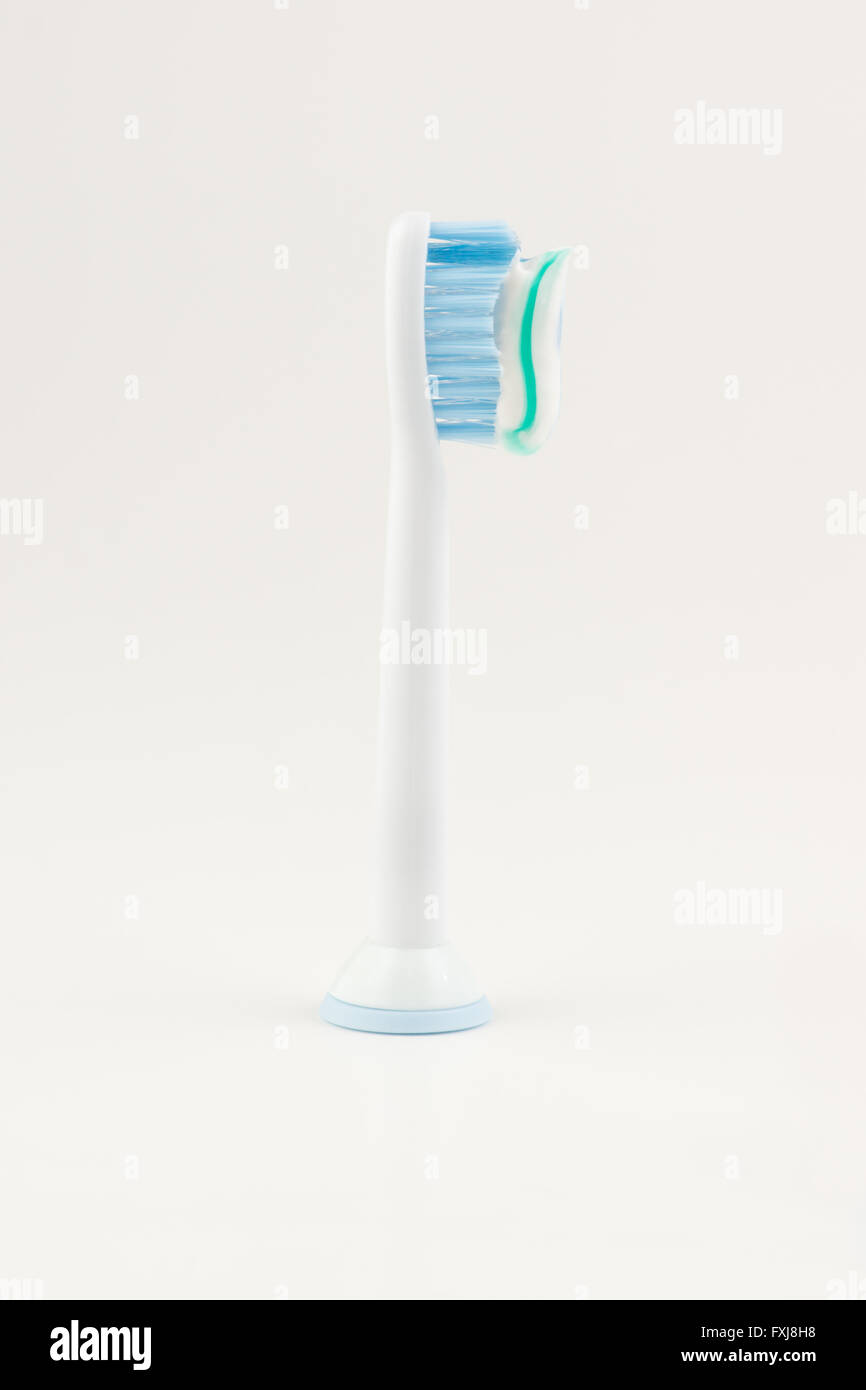 attachment for an electric toothbrush with toothpaste Stock Photo