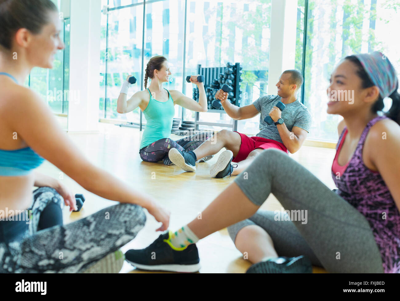 Women talking and resting at gym Stock Photo