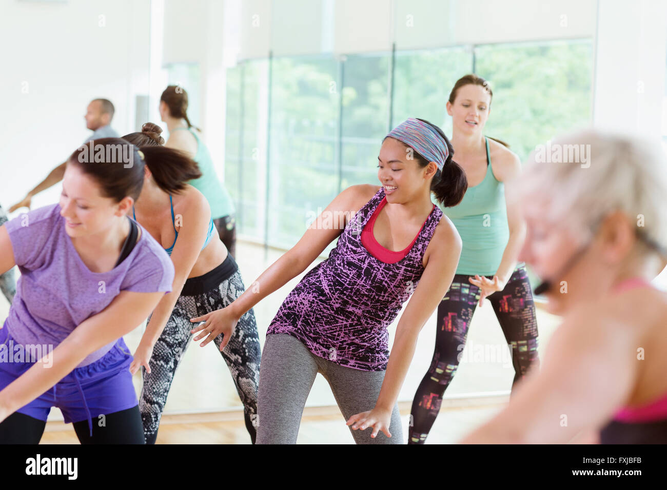 Women enjoying aerobics class Stock Photo