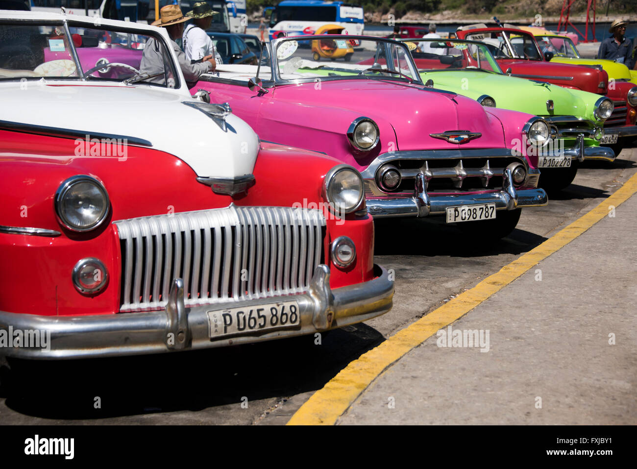 Horizontal close up of colourful classical Chevrolets parked in Havana, Cuba. Stock Photo