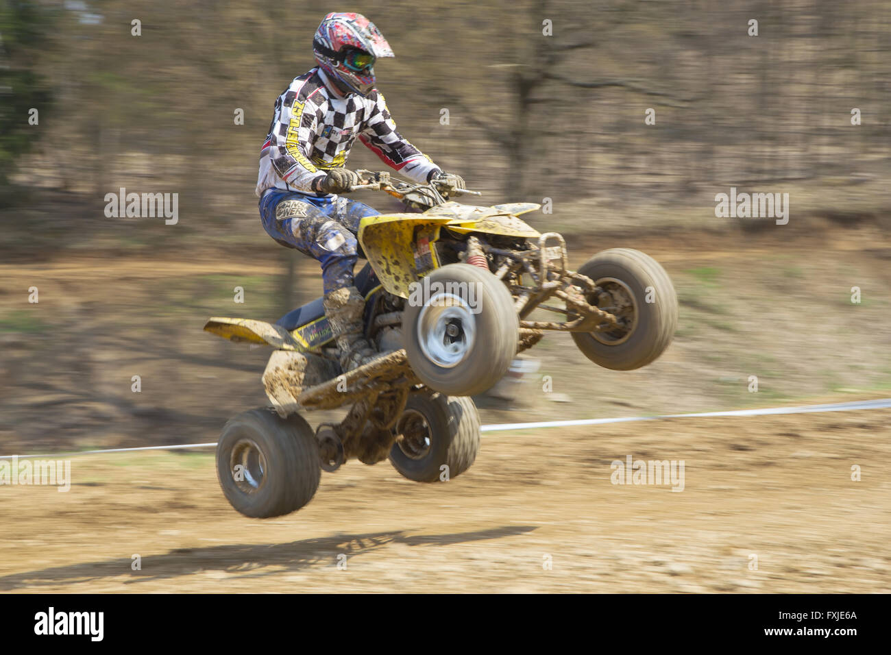 Dynamic shot of racer on quad motorbike in the race Stock Photo
