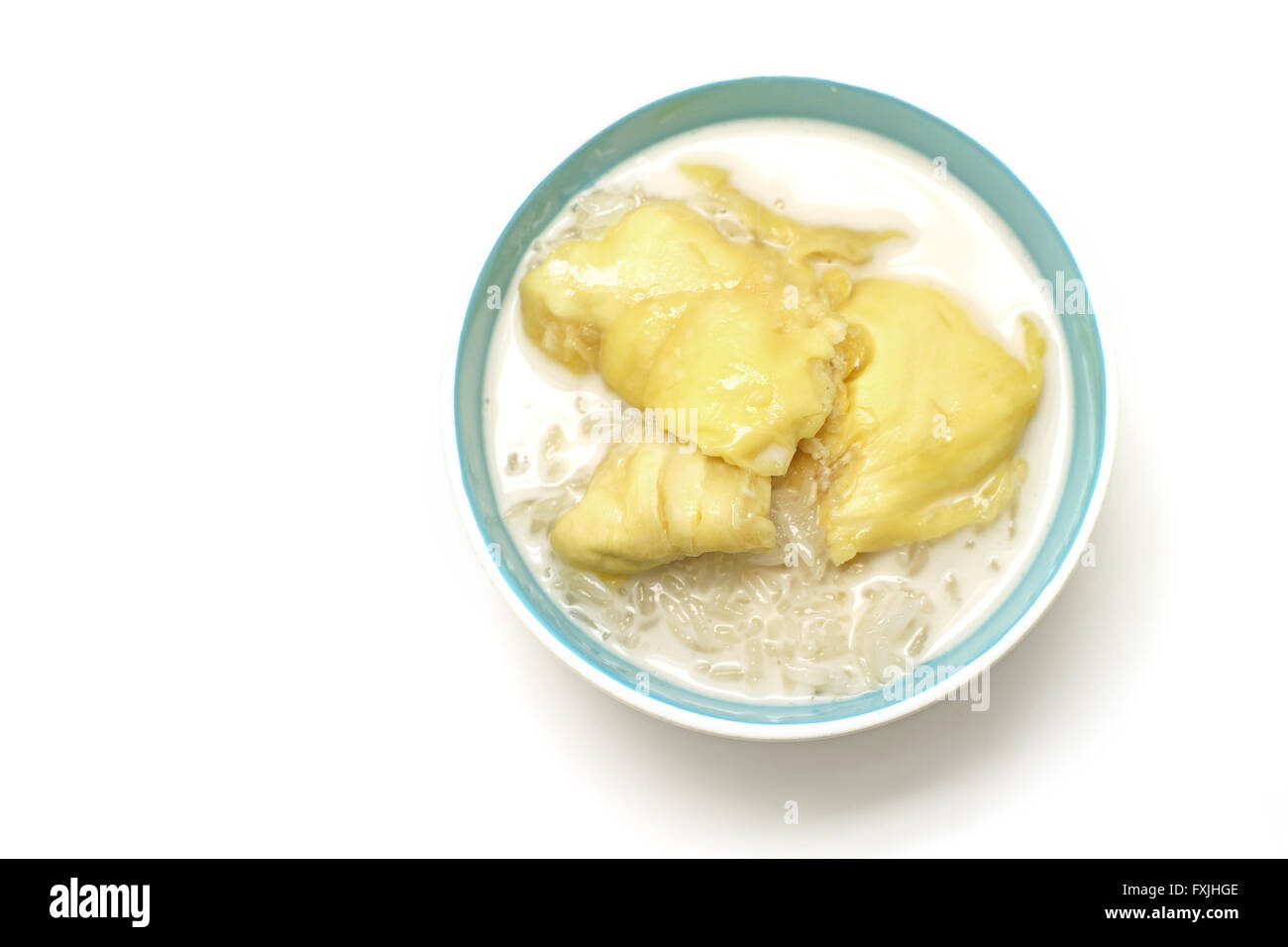 thai dessert, durian sticky rice with coconut milk sauce isolated on