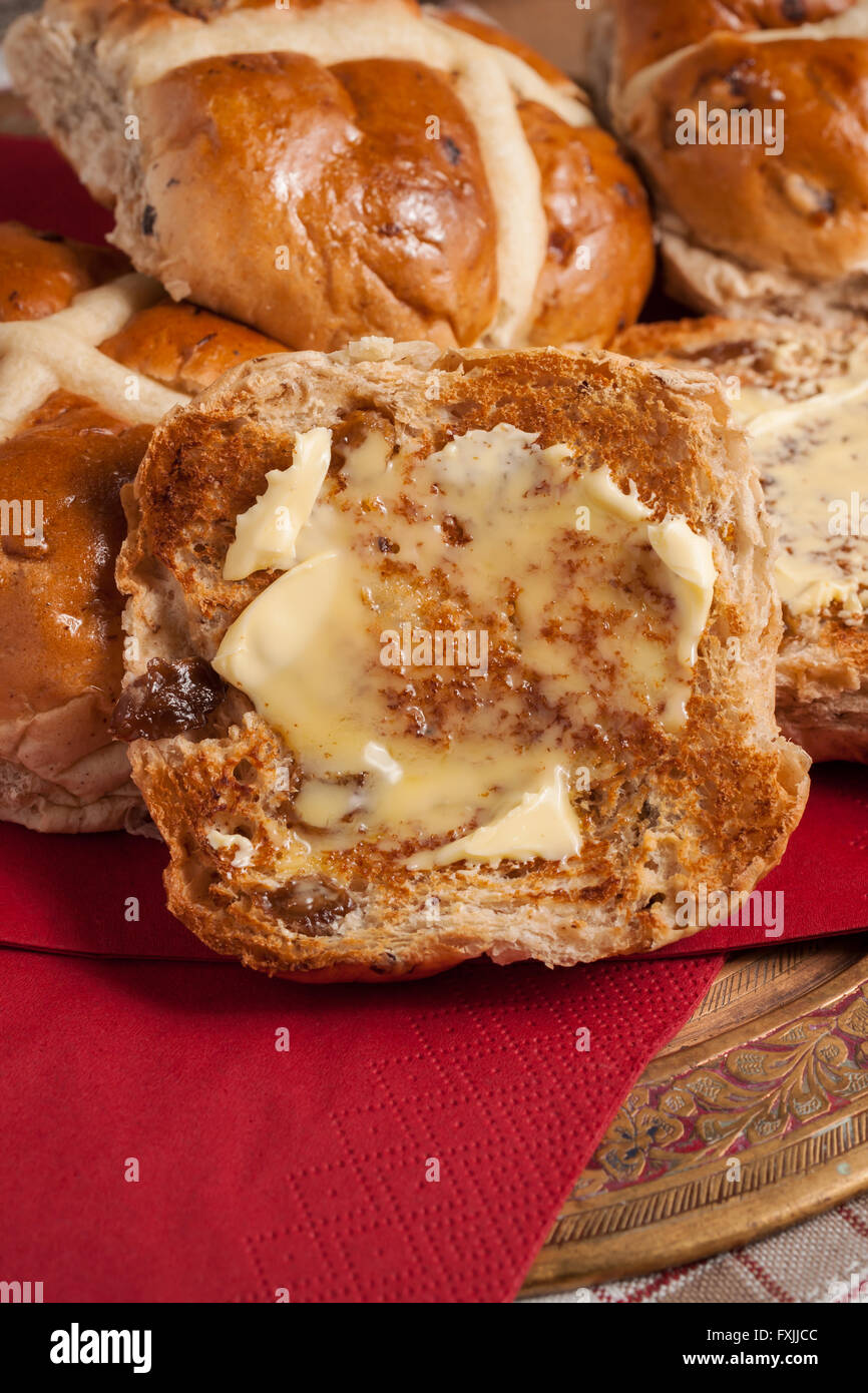 Hot Cross Buns toasted and buttered Stock Photo