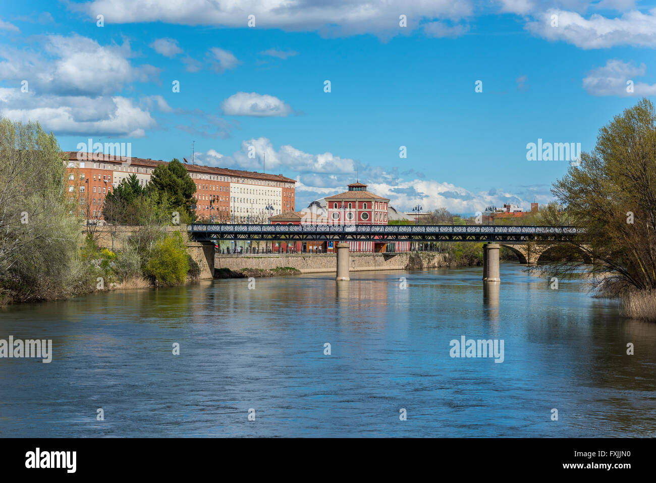 Iron bridge over Ebro river. Is the entrance to the city on the Way of Saint James. Science museum in background. Logroño. Spain Stock Photo
