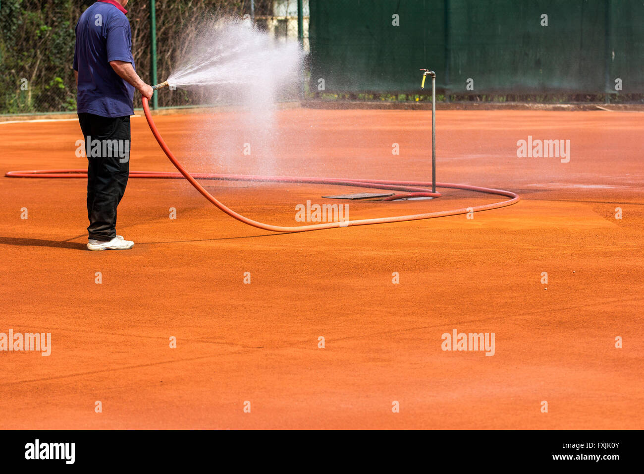 Wet tennis court hires stock photography and images Alamy