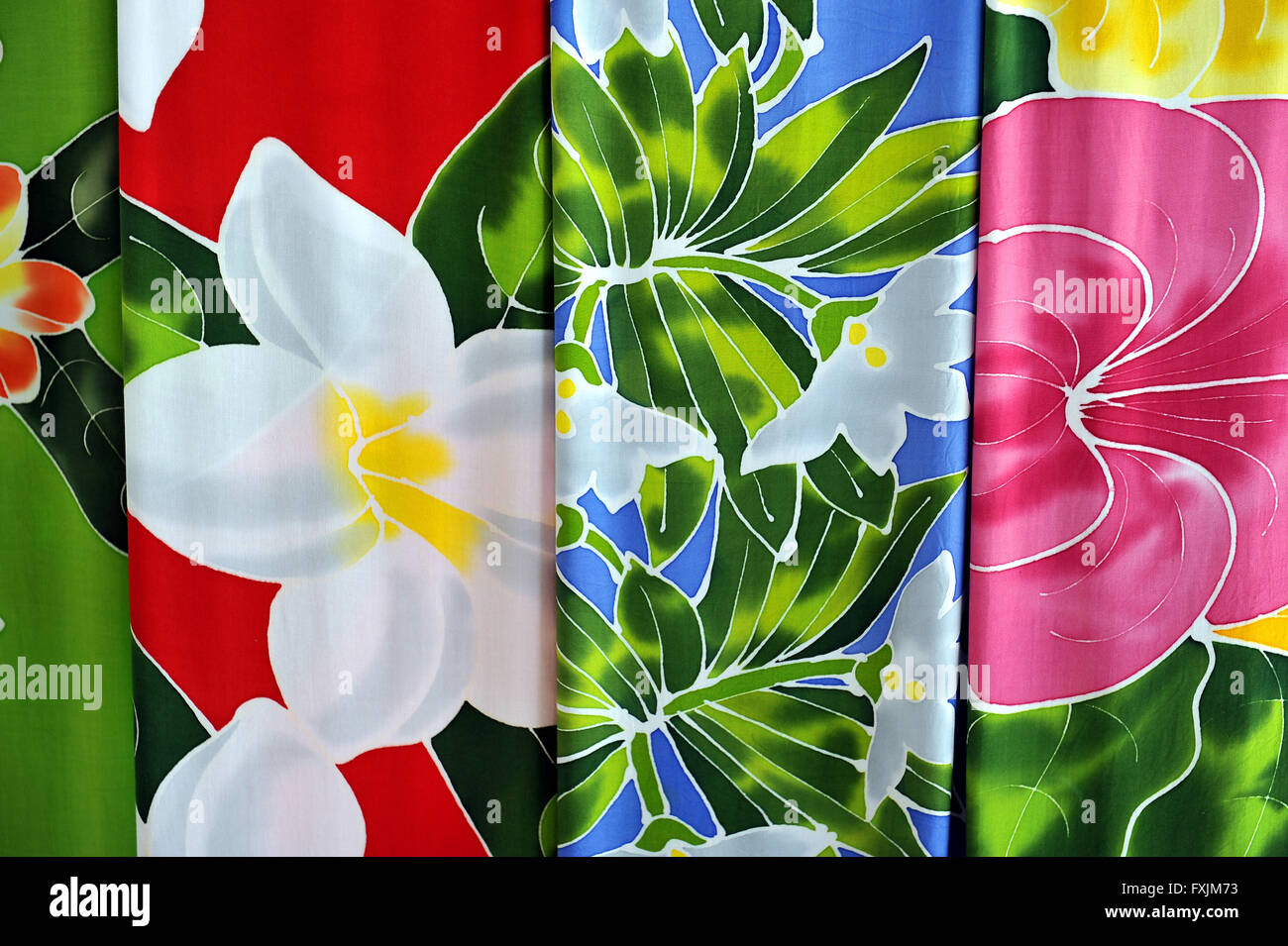 Tahiti, French Polynesia. Typical Polynesian sarongs in flowers for