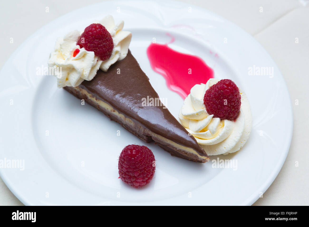 Raspberry chocolate torte dessert Stock Photo Alamy