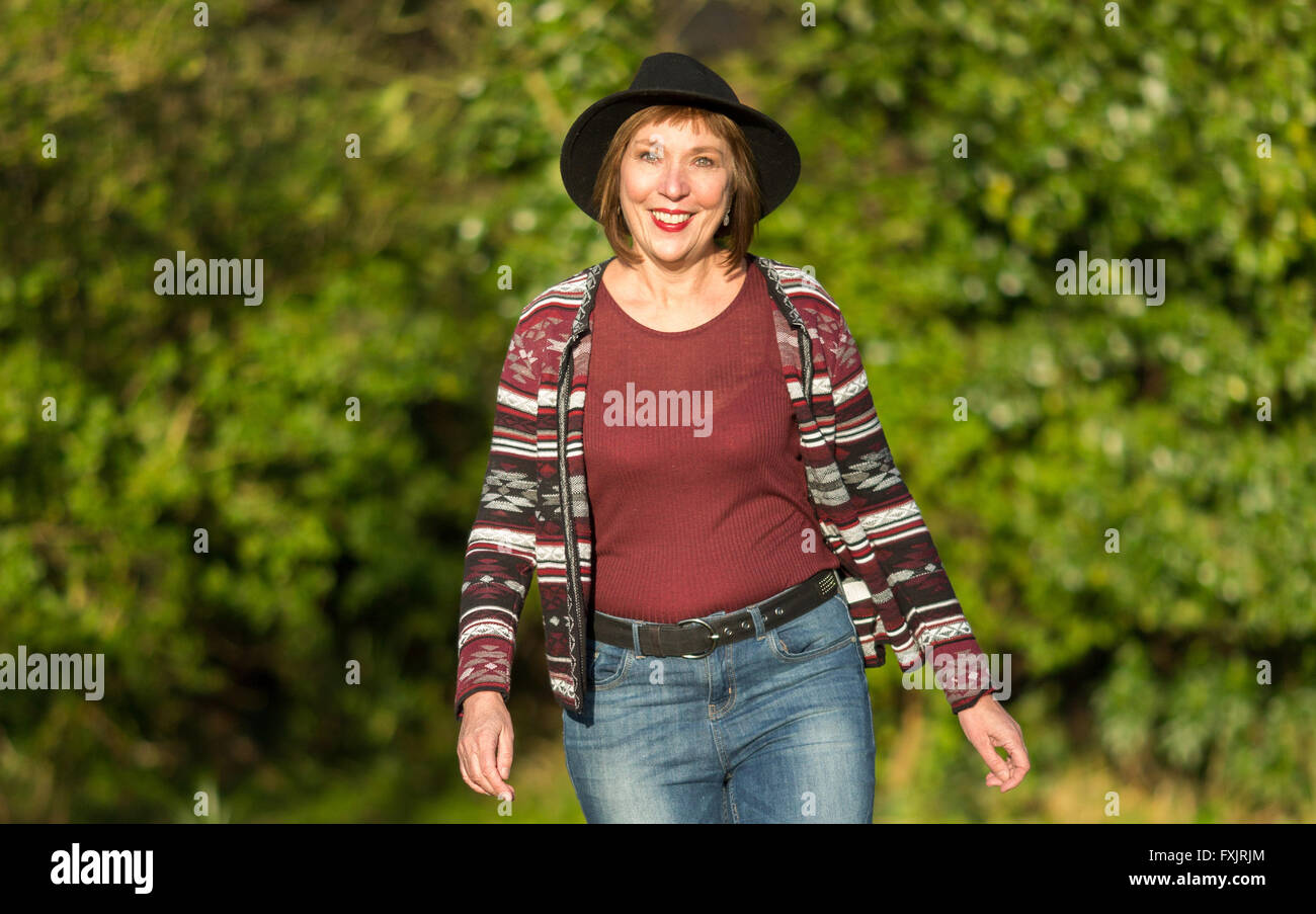 portrait of middle age woman outdoors Stock Photo