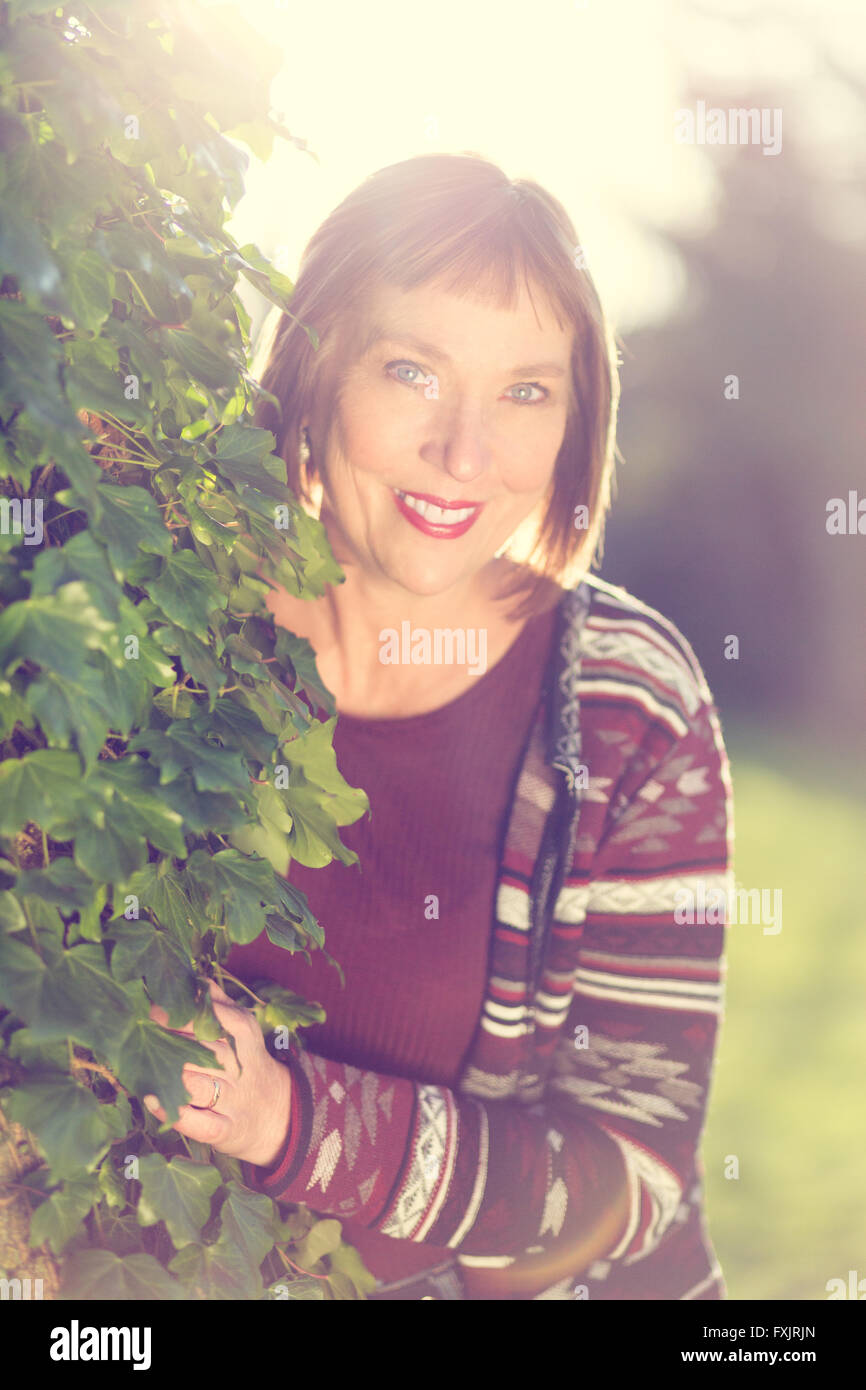 portrait of middle age woman outdoors Stock Photo