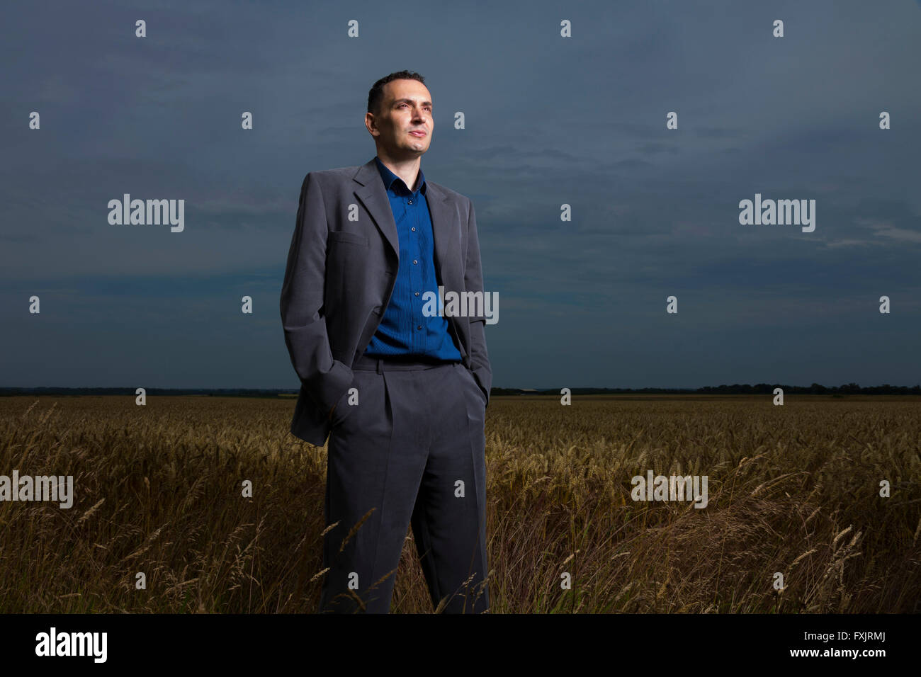 young man stood outside in countryside Stock Photo