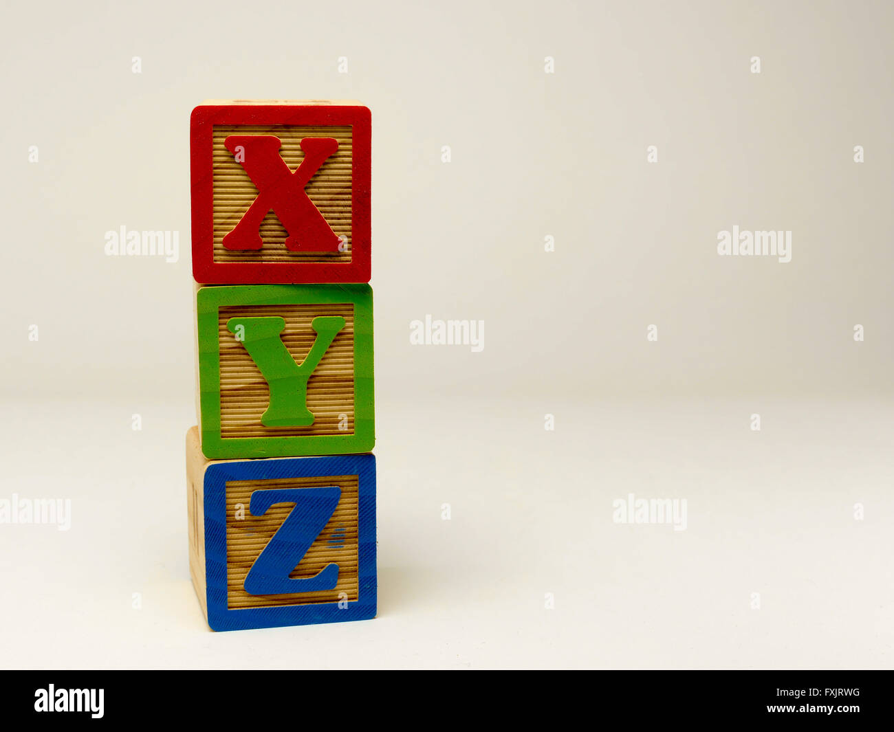 Kid s building blocks spelling the word xyz Stock Photo Alamy