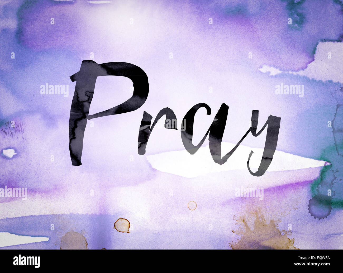 The word "Pray" written in black paint on a colorful watercolor washed background Stock Photo