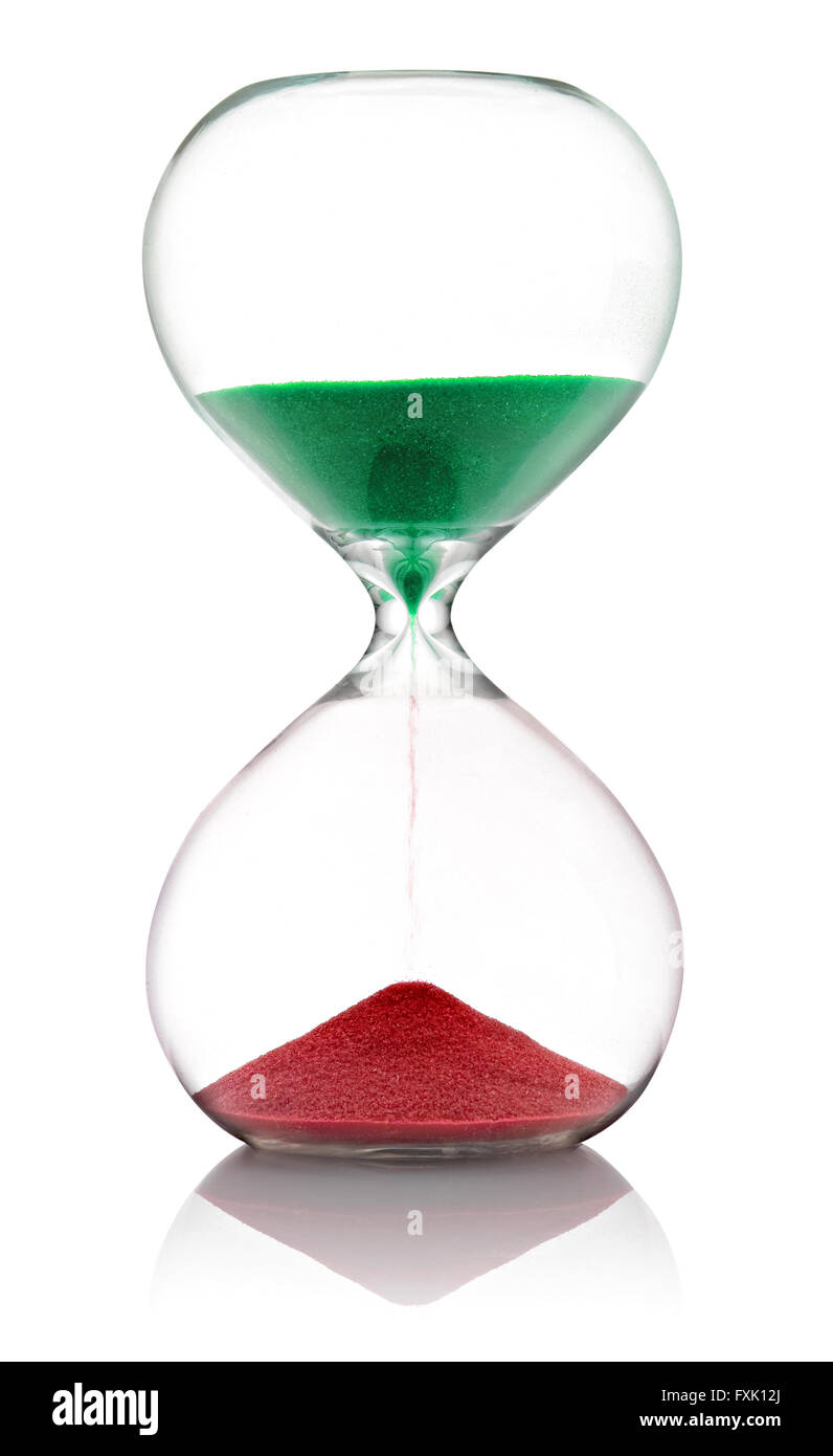 Single isolated hourglass with green sand pouring into red pile over white background Stock Photo