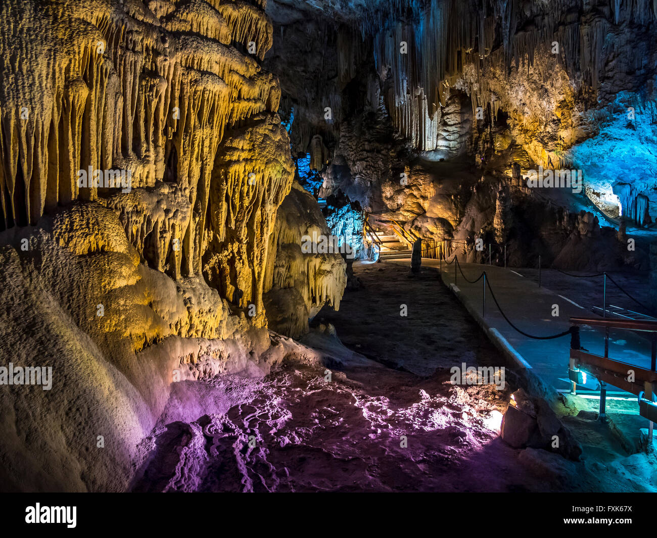 Stalactites in the colorfully lit cave Cuevas de Nerja, Costa del Sol, Malaga province, Andalucía, Spain Stock Photo