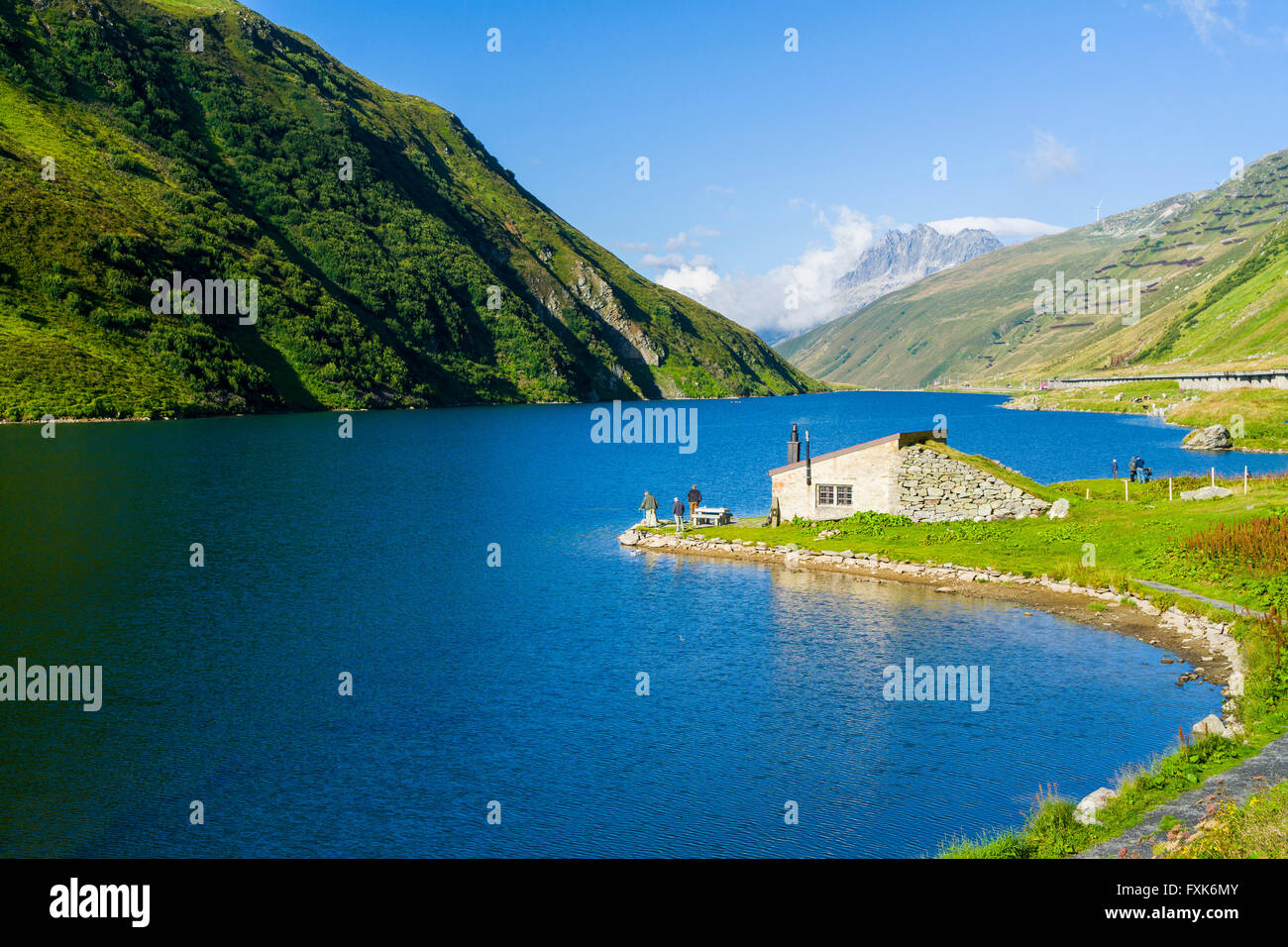 Landscape with mountains and the lake of a high altitude hydroelectric power plant, Oberalp Pass, Andermatt, Uri, Switzerland Stock Photo