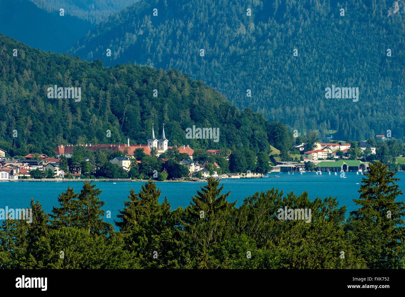 View over Lake Tegernsee on the monastery of the city Tegernsee, Upper Bavaria, Bavaria, Germany Stock Photo